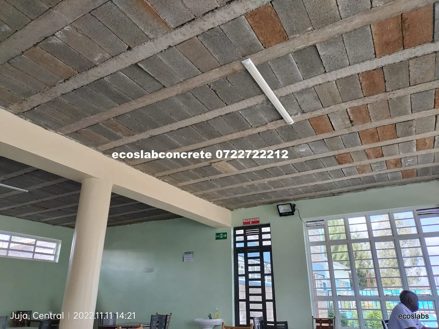 Finished interior ceiling supported by an EcoSlabs concrete slab system