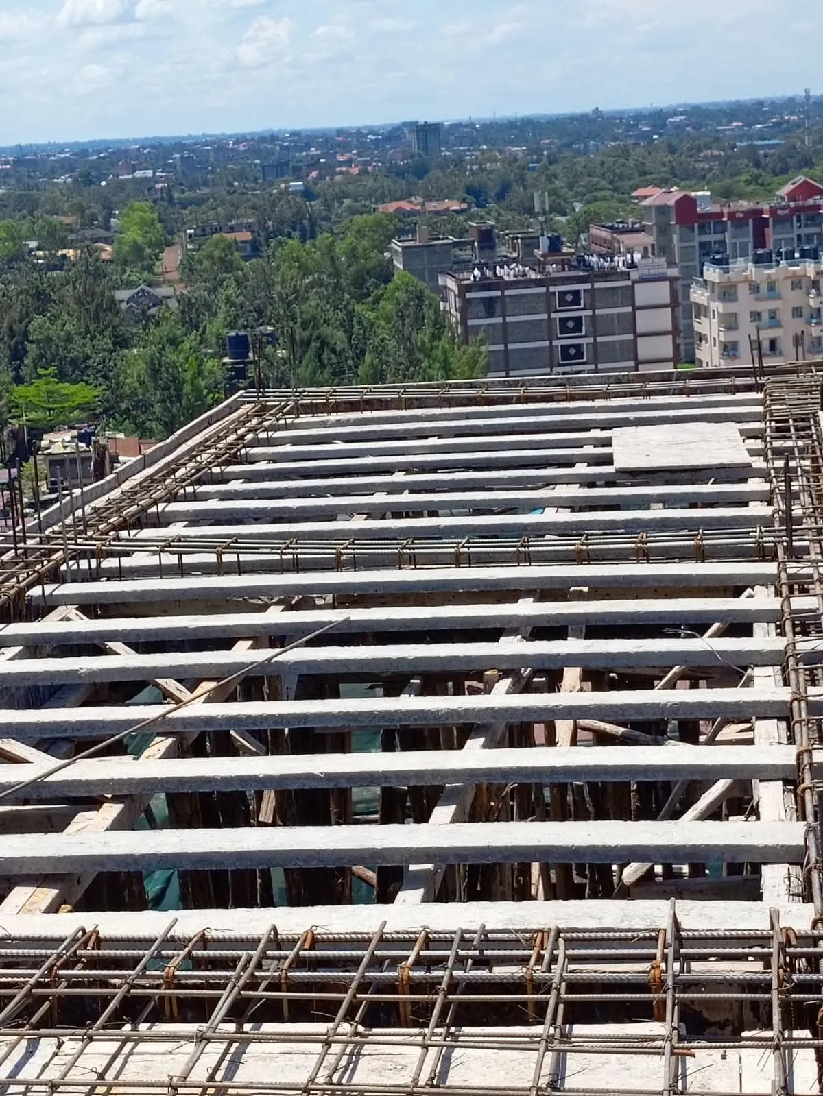 Pre-stressed concrete slab beams installed across a building floor