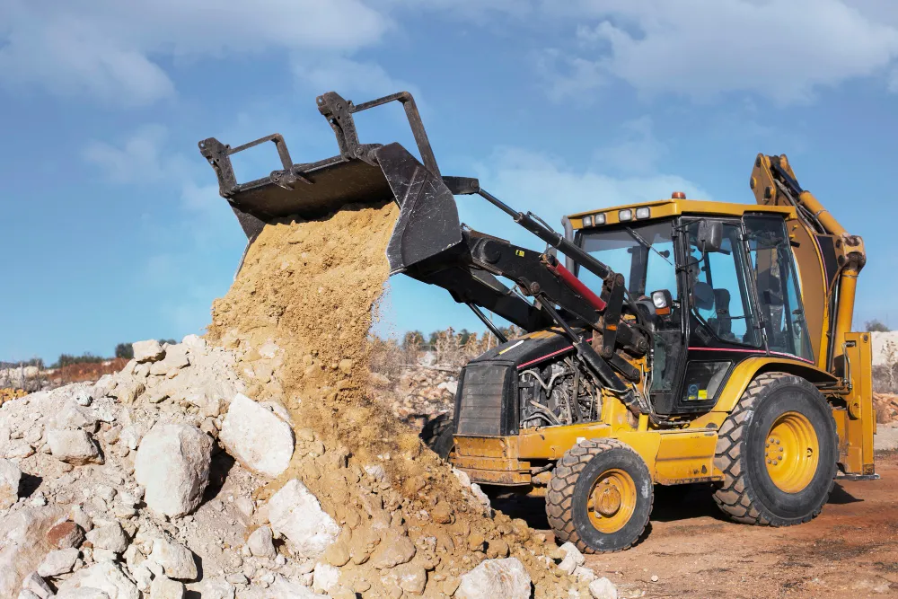 Backhoe loader carrying out excavation and earthworks